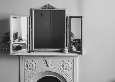 Mirror and fireplace at True Nature Clinic