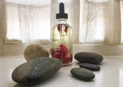 Aromatherapy oils and pebbles at True Nature Clinic